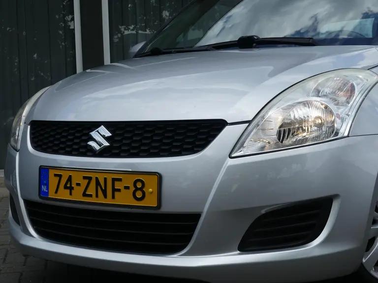 Suzuki Swift 1.2 Bandit 94 pk, Dealer oh., Airco, Cruise 16" Lichtmetalen Velgen. afbeelding 24